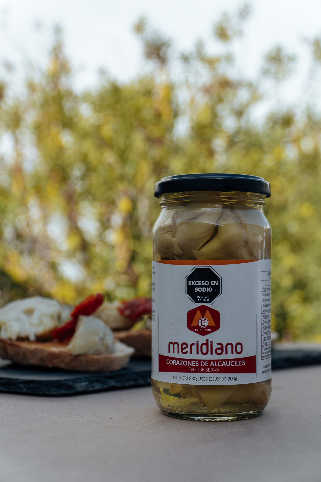 Queso brie tibio con confitura Meridiano, ideal para picada